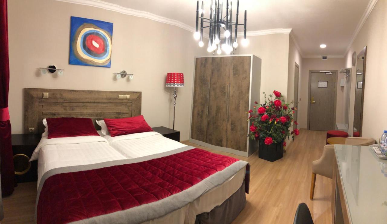Grace Point Hotel Astana Quarto foto