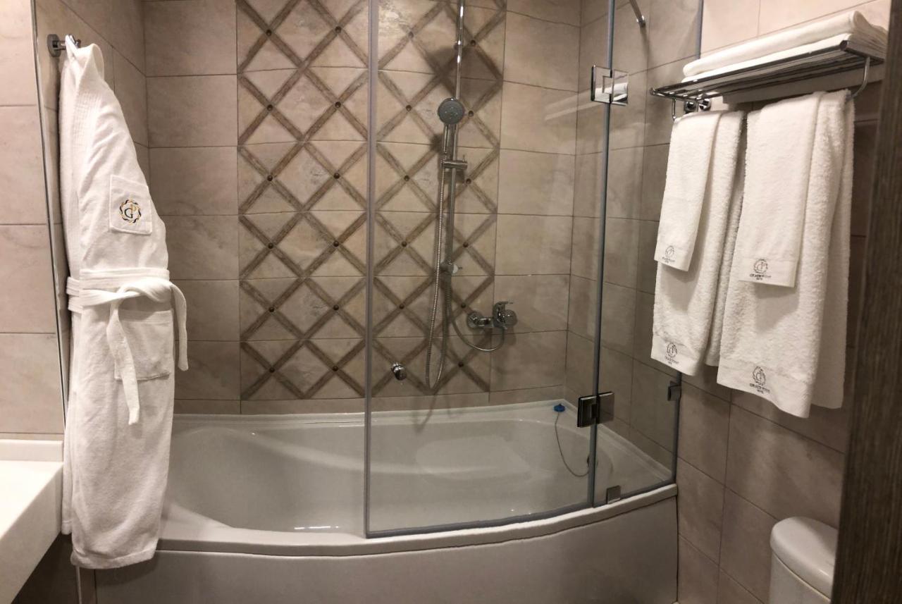 Grace Point Hotel Astana Quarto foto
