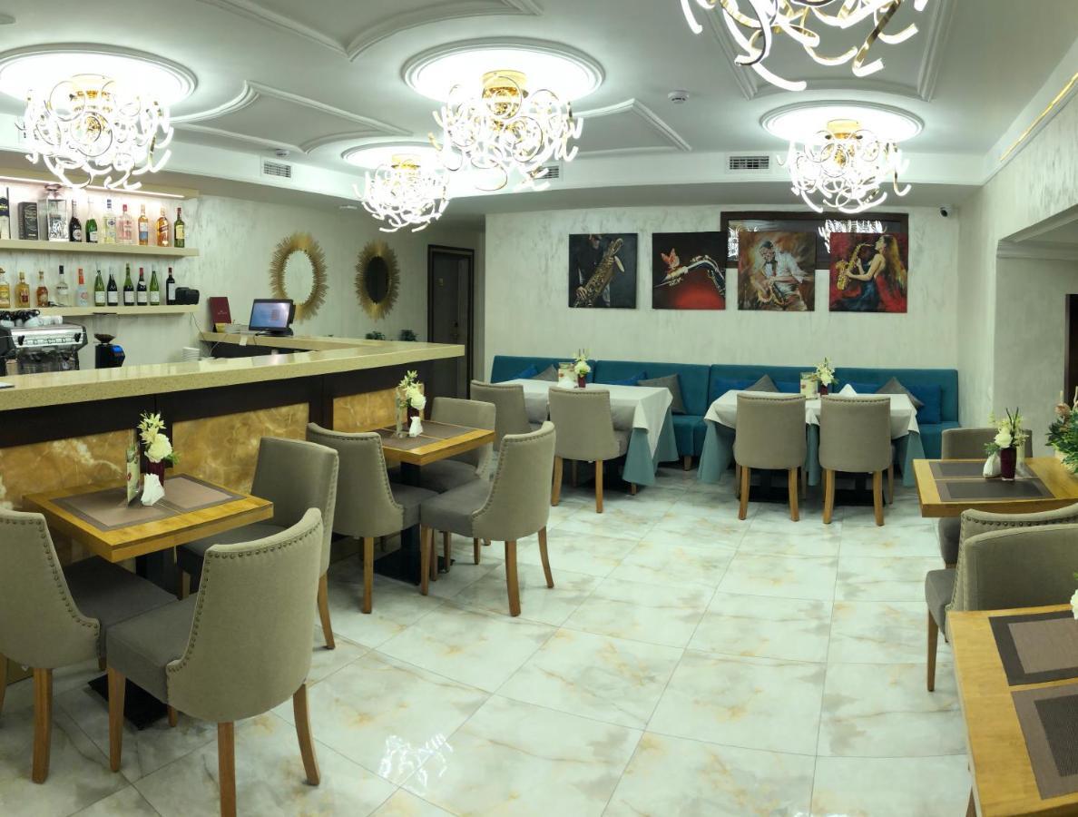 Grace Point Hotel Astana Quarto foto