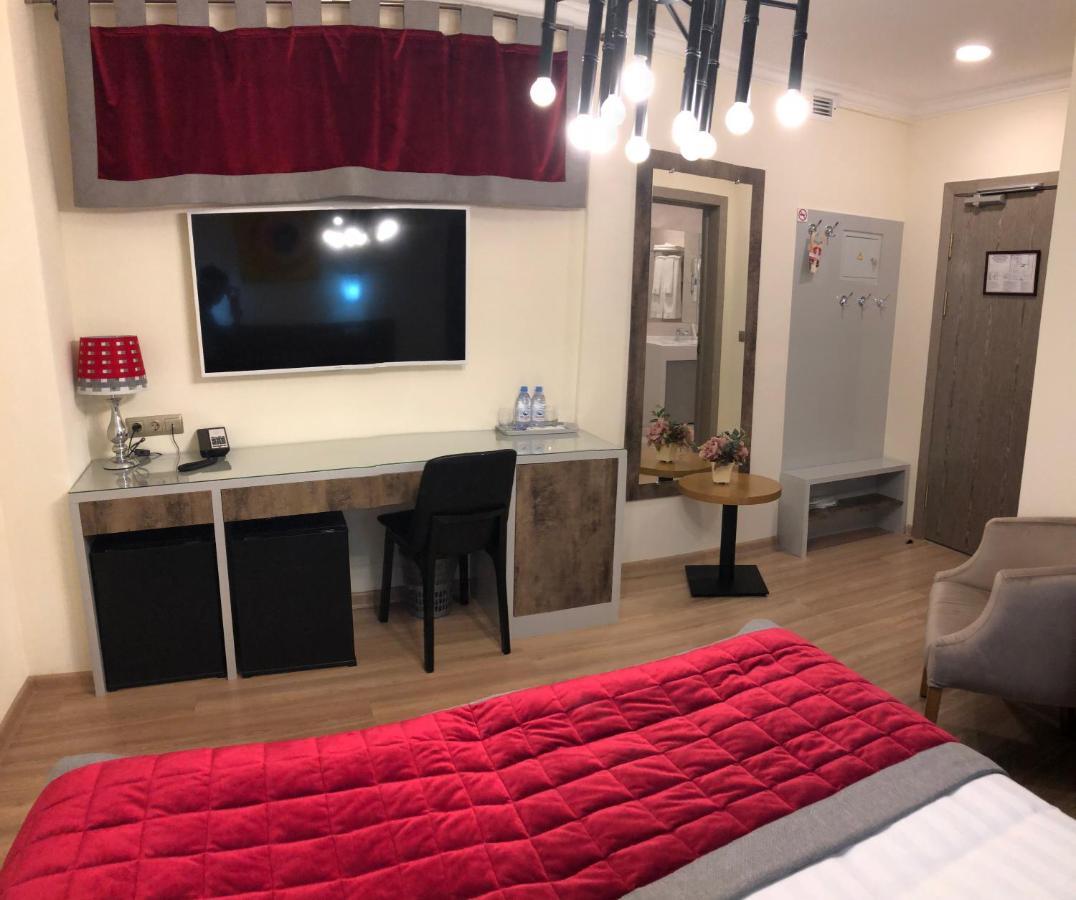 Grace Point Hotel Astana Quarto foto